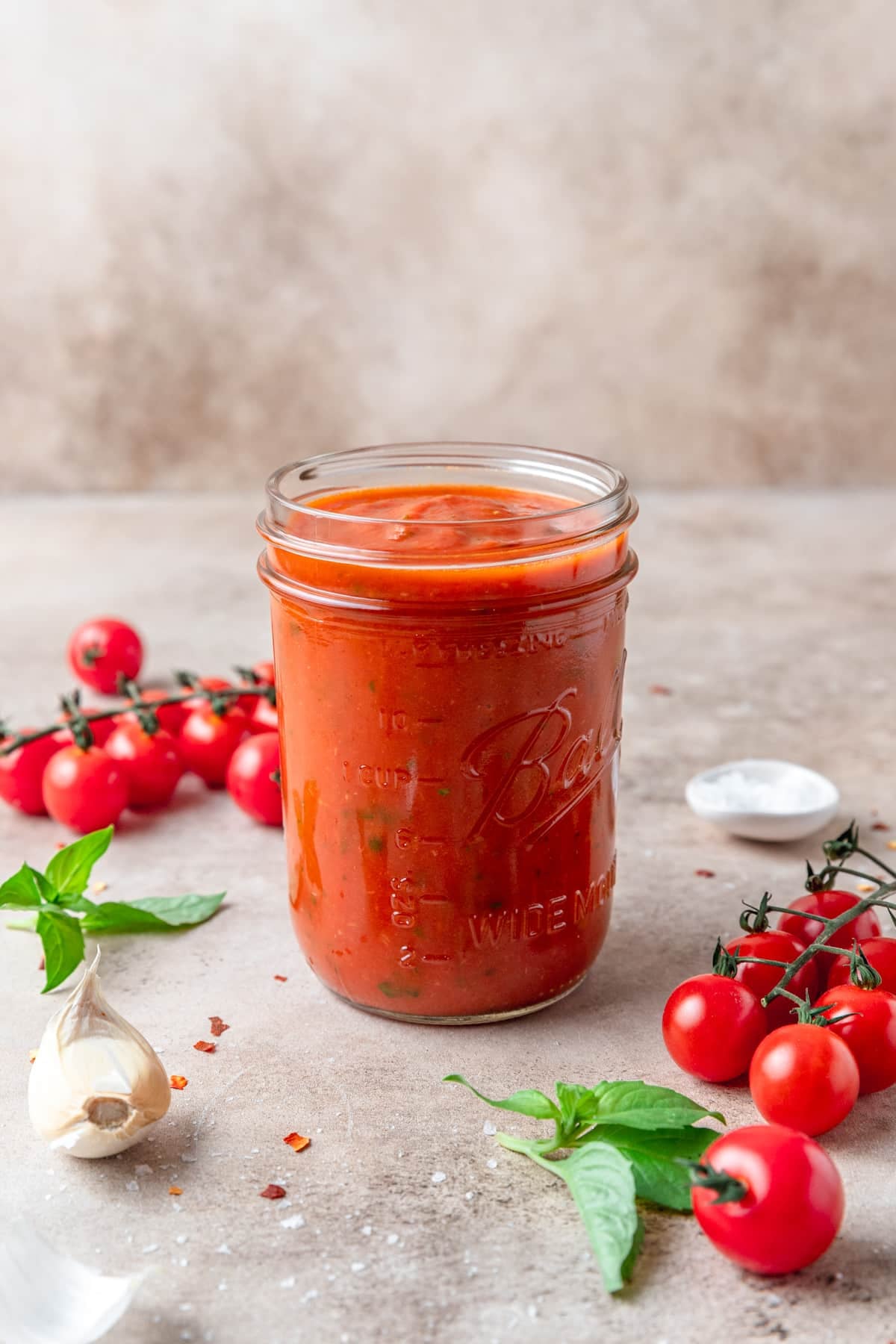 jar of homemade san Marzano pizza sauce. 