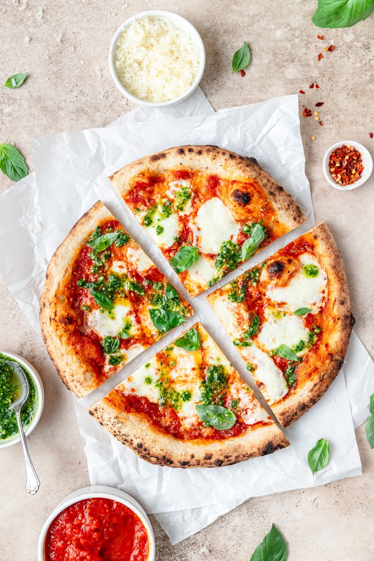 sourdough pizza crust with tomato sauce and mozzarella cut into slices.