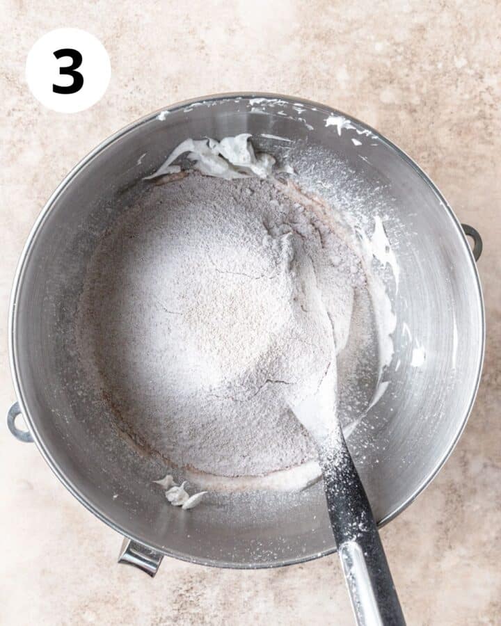 adding dry ingredients to meringue.
