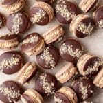 chocolate peanut butter macarons dipped in dark chocolate.