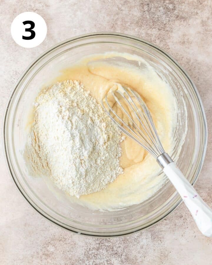 adding flour and cornmeal to batter.