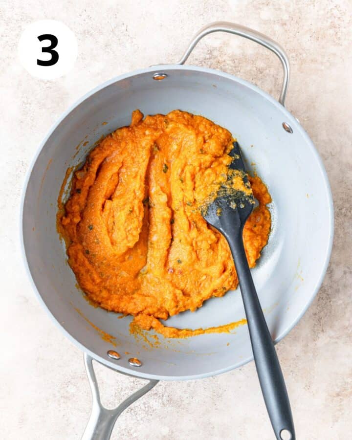 adding vodka and pumpkin puree to sauce.