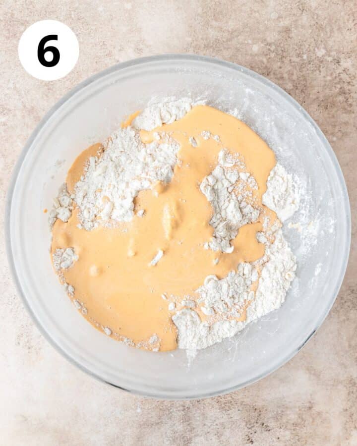 adding wet ingredients to flour. 