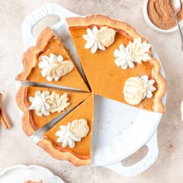 bourbon pumpkin pie with whipped cream.