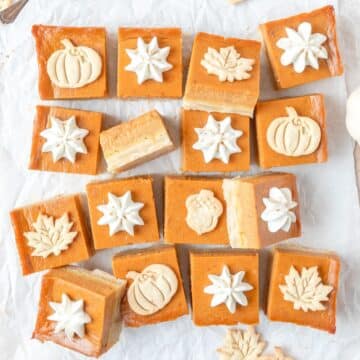 pumpkin pie bars with shortbread crust and maple whipped cream.