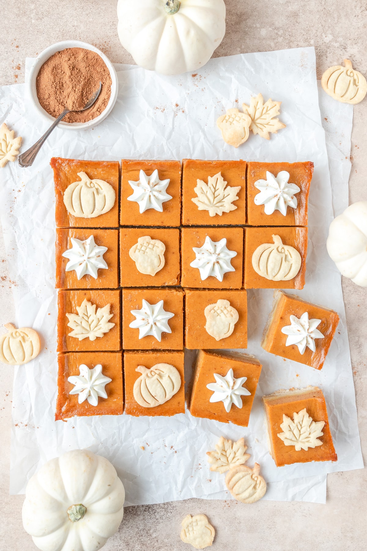 pumpkin pie bars with pie crust leaf cutouts. 