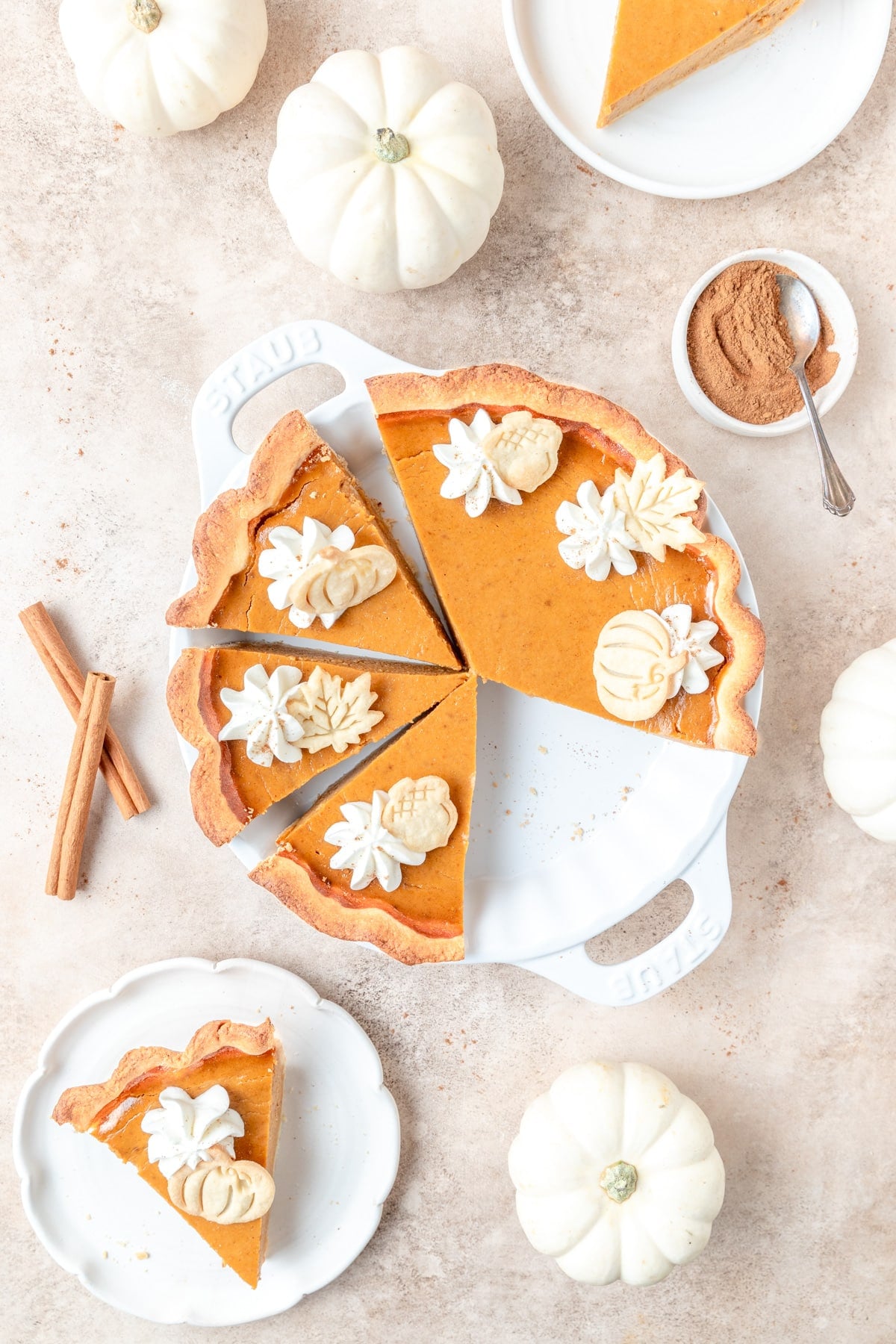 bourbon pumpkin pie cut into slices.