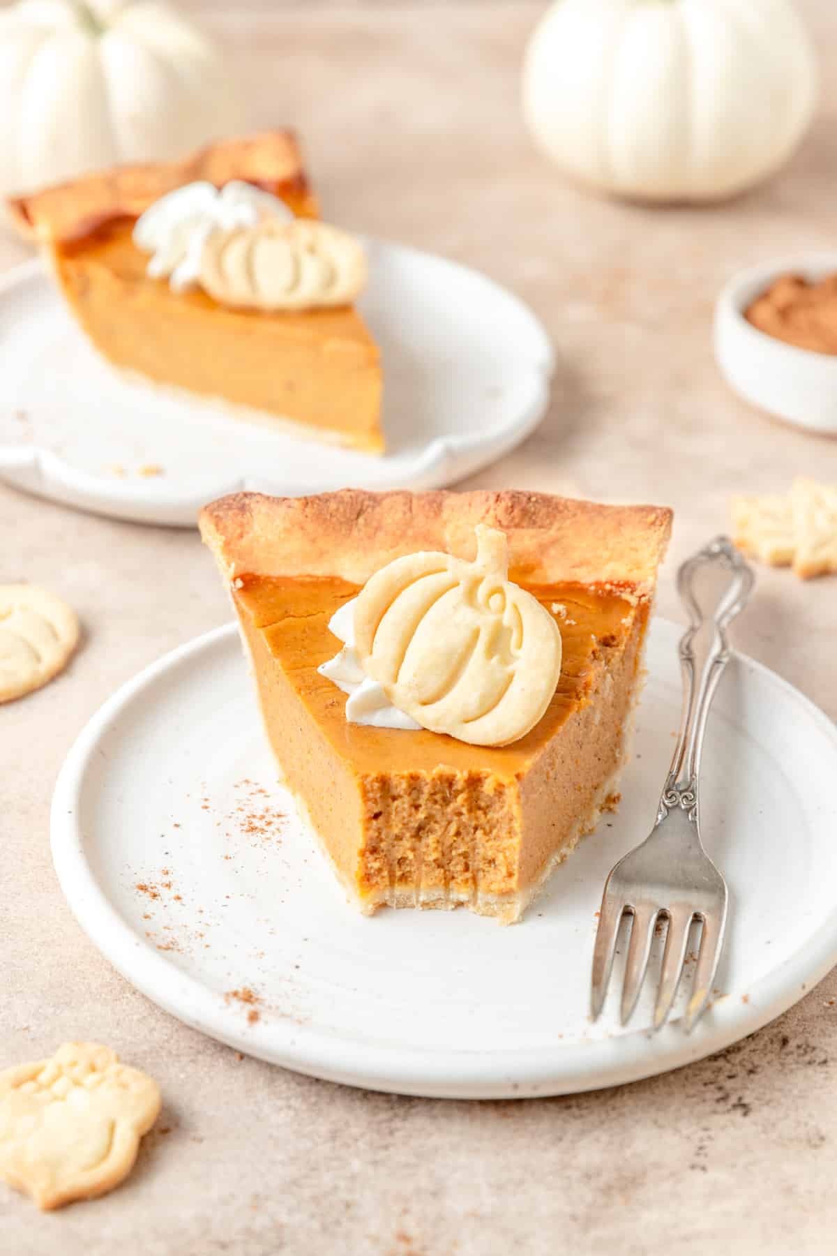 pumpkin pie with bite taken out.