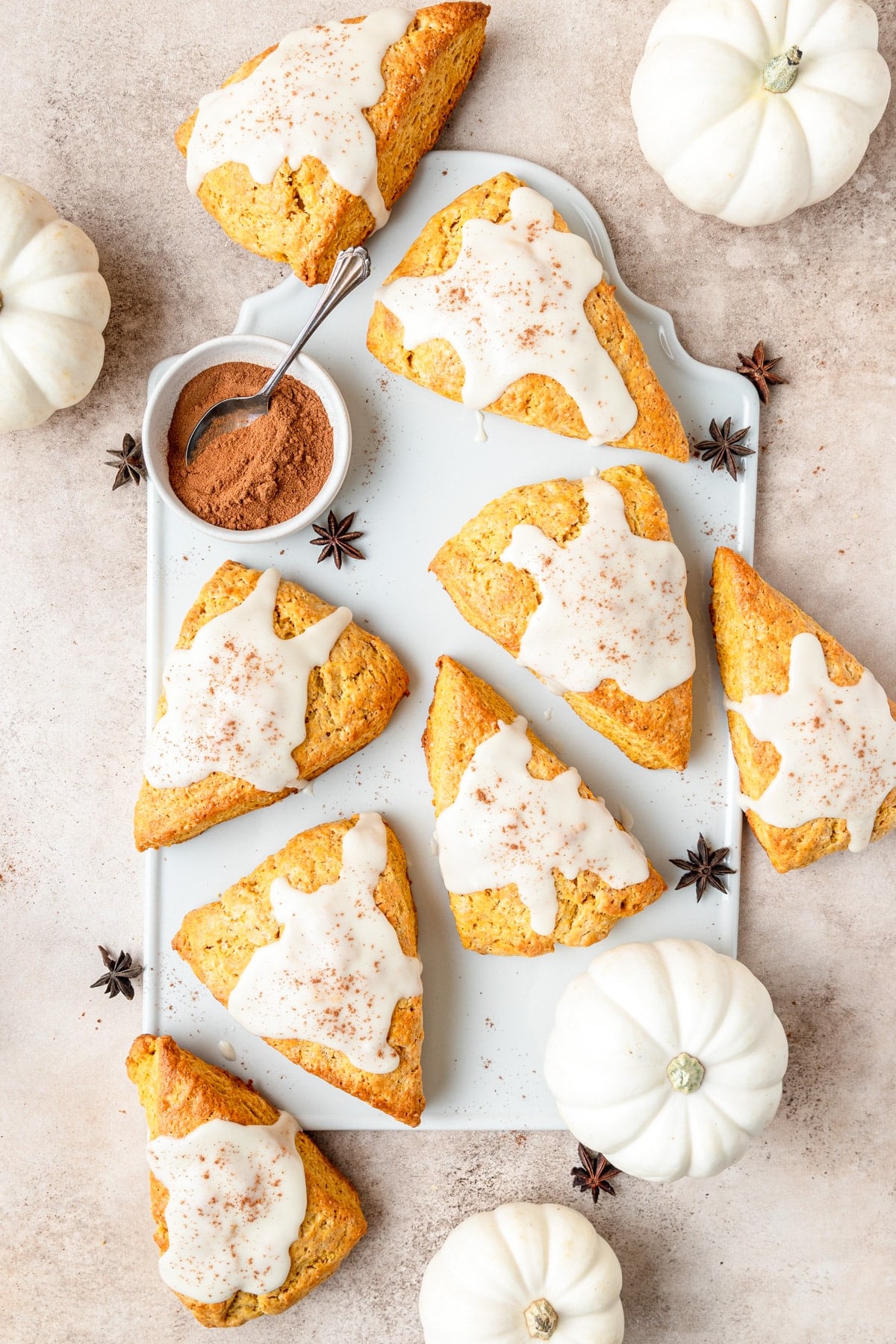 pumpkin spice scones topped with maple glaze.