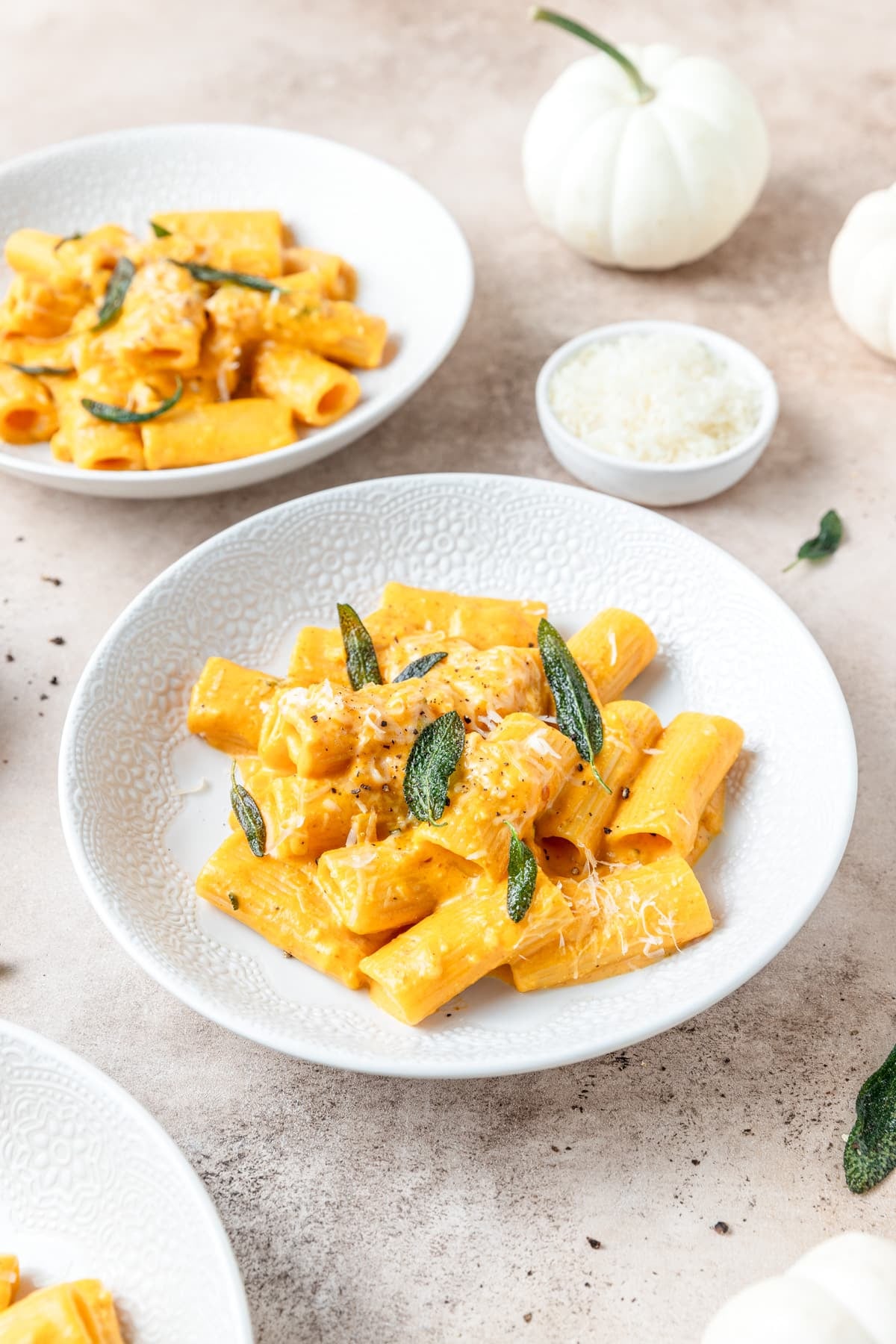 bowls of creamy pumpkin pasta.