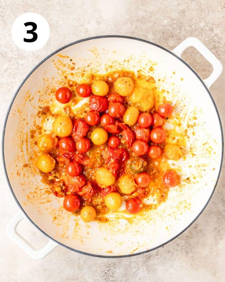 burst cherry tomatos in pan.