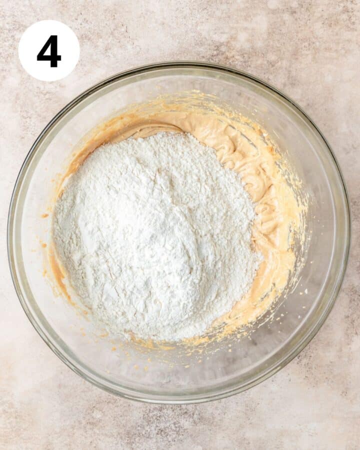 adding dry ingredients to biscotti dough.