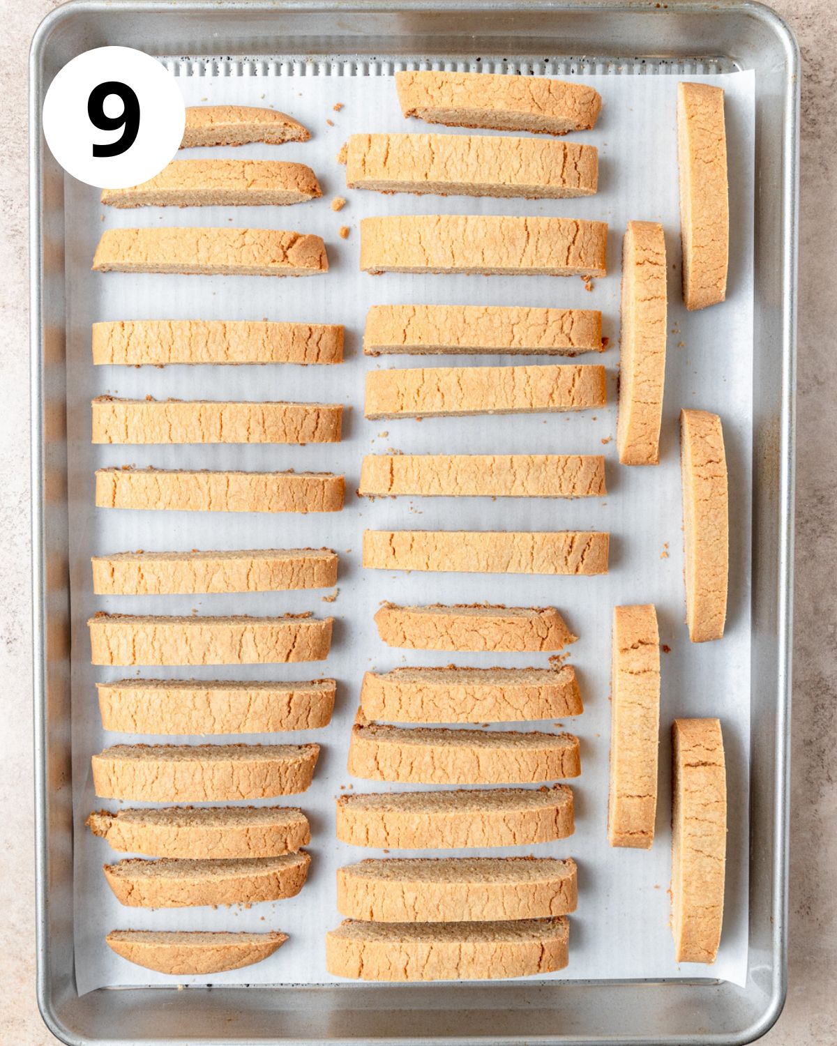 biscotti slices on baking sheet.