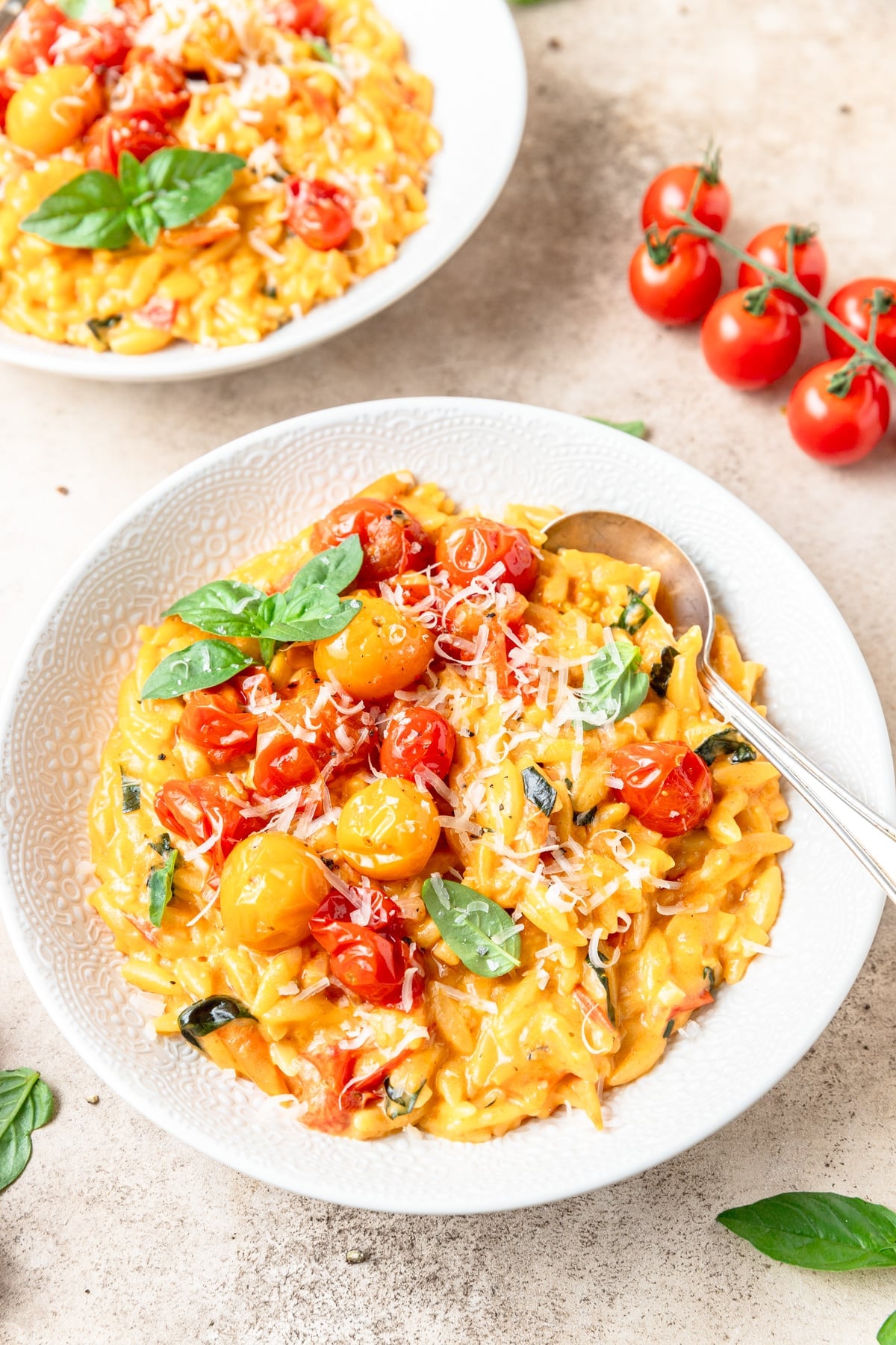 bowl of creamy tomato basil orzo.