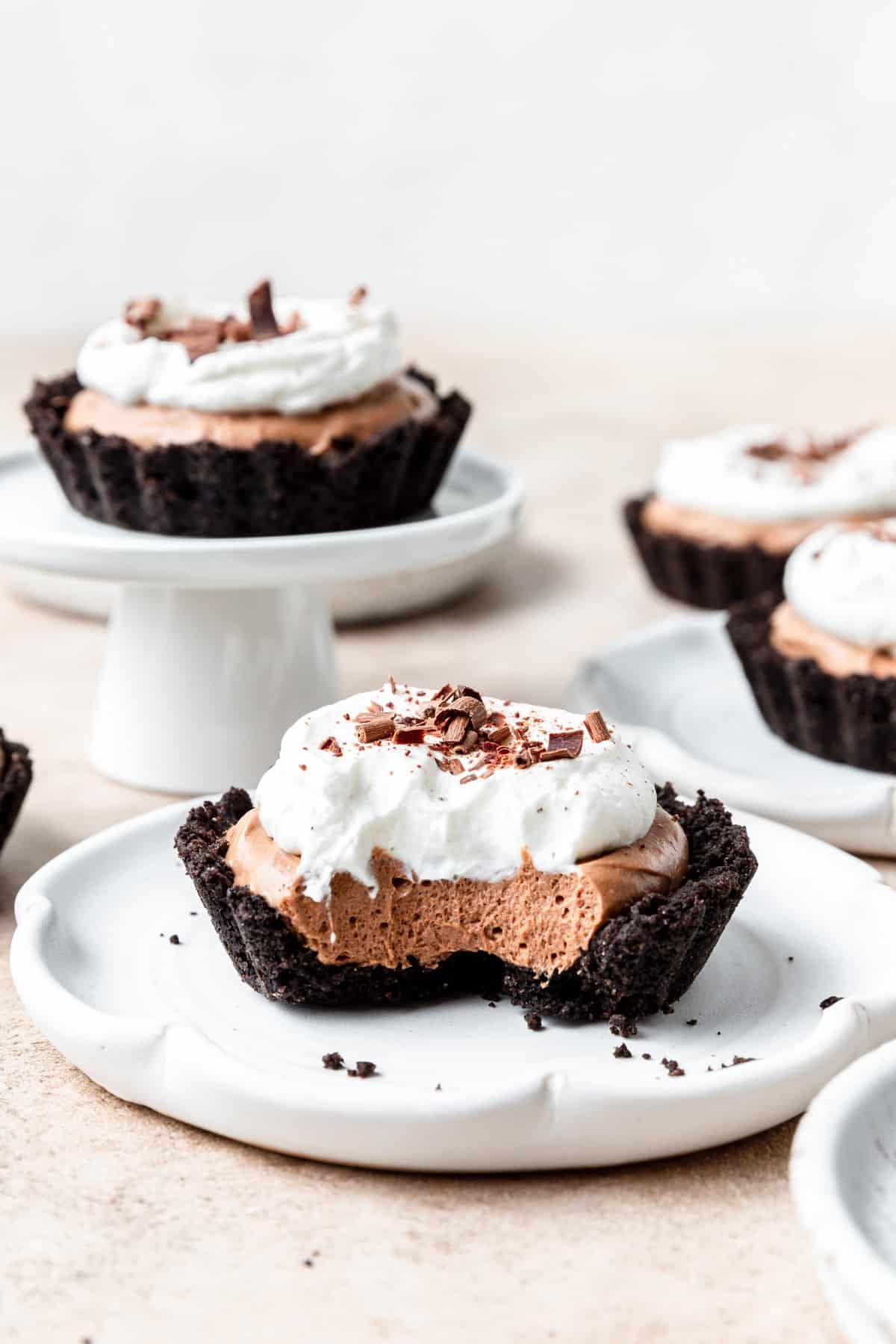 mini chocolate mousse tart with bite taken out.