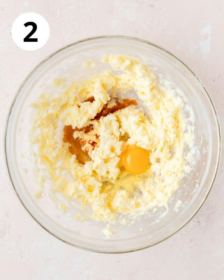 adding egg and vanilla to butter.