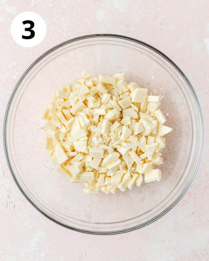 chopped white chocolate in bowl.