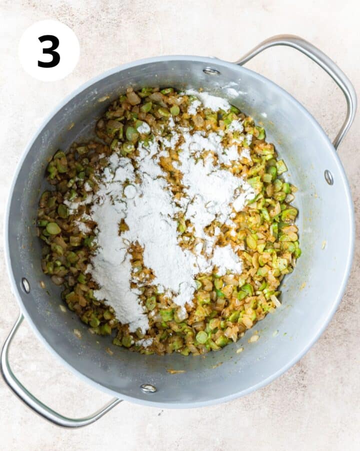 adding flour to thicken soup.