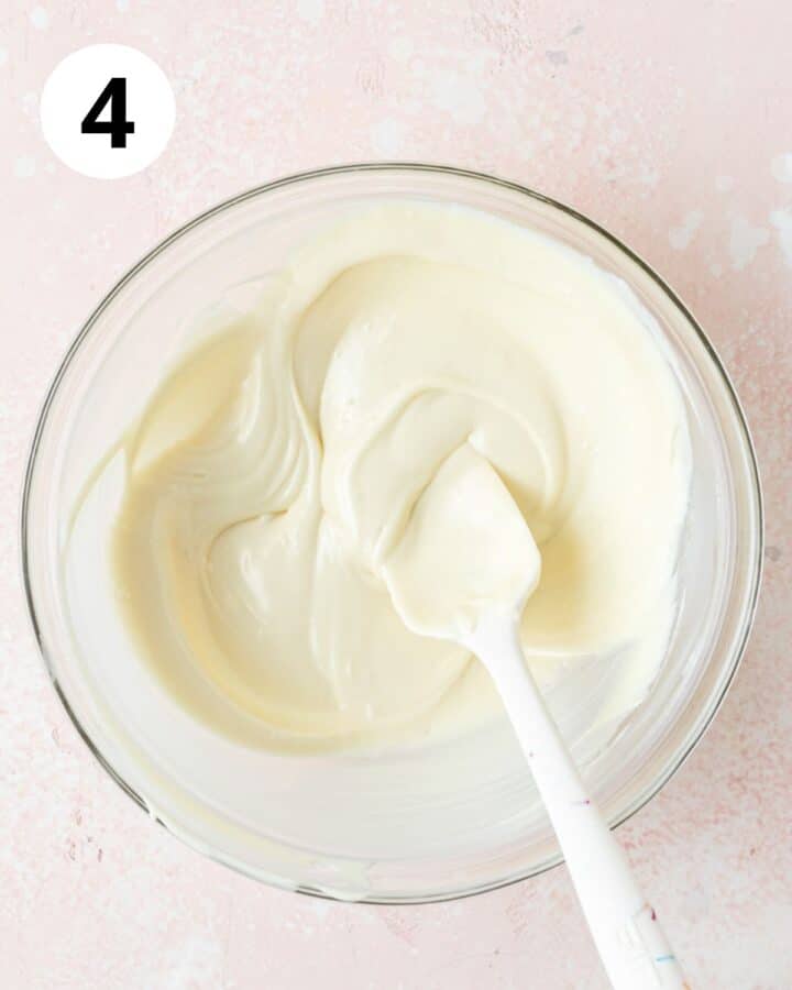 melted white chocolate in bowl.