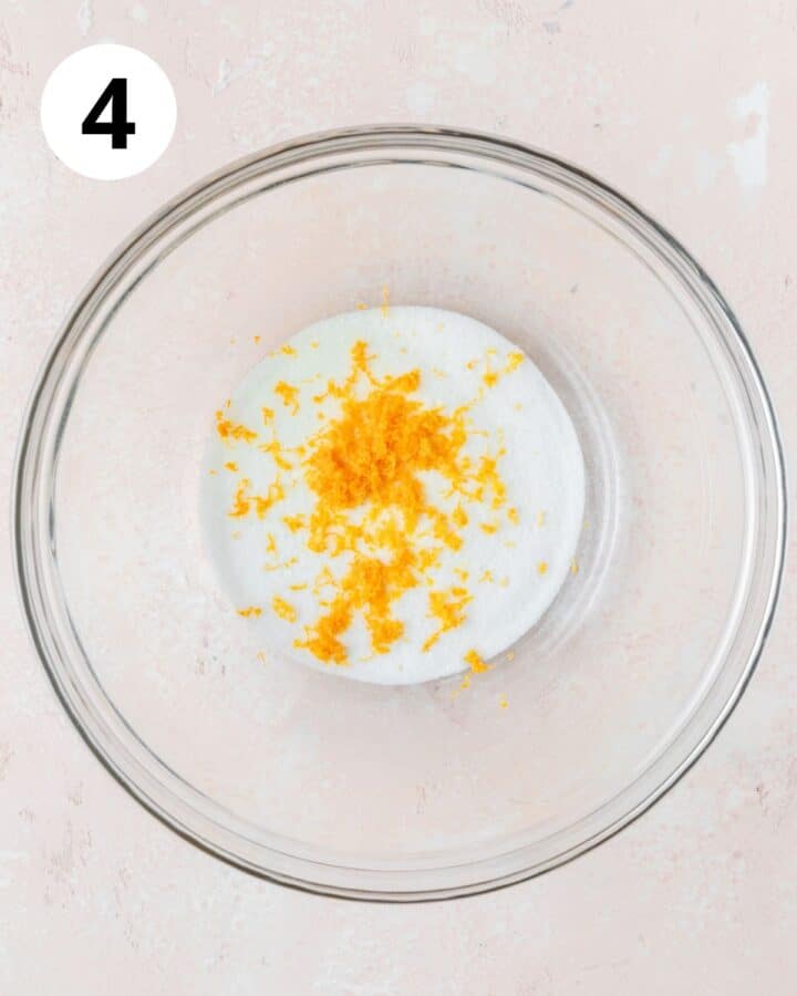 orange zest and sugar in bowl.