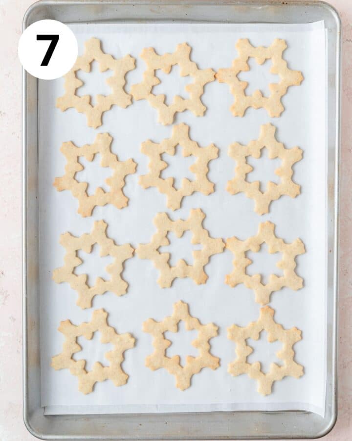 snowflake linzer cookies after baking.