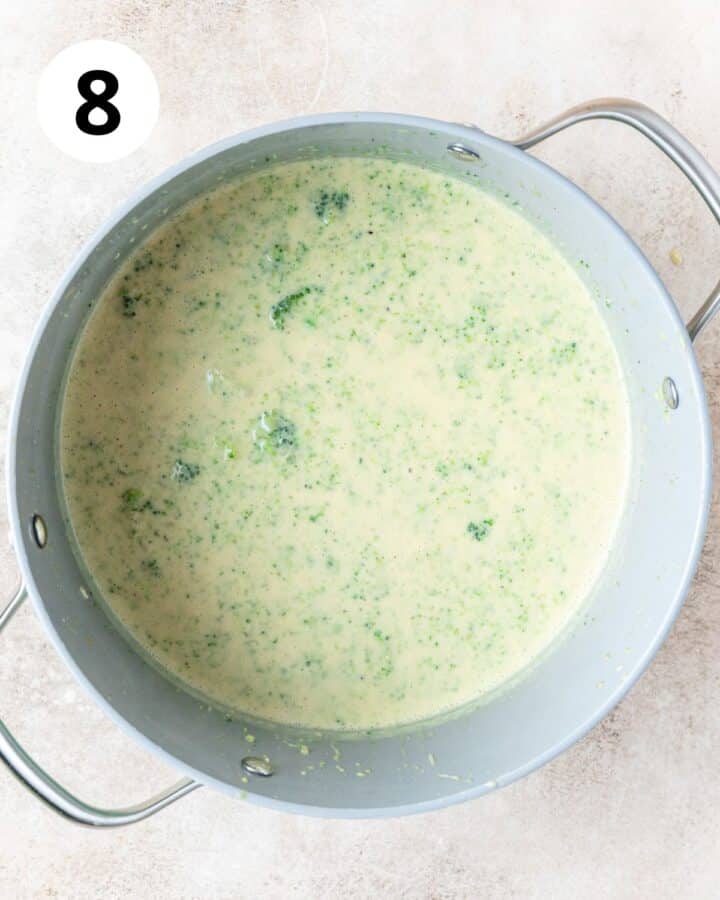 creamy broccoli cheddar soup in pot.