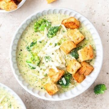 bowl of broccoli white cheddar soup with homemade croutons.
