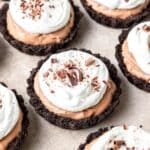 mini chocolate mousse tarts with oreo crust.