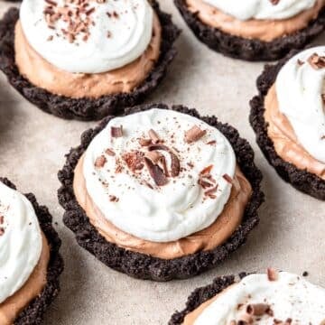mini chocolate mousse tarts with oreo crust.