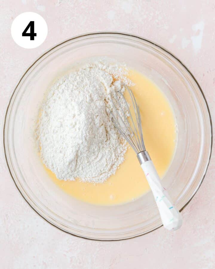 adding dry ingredients to batter.