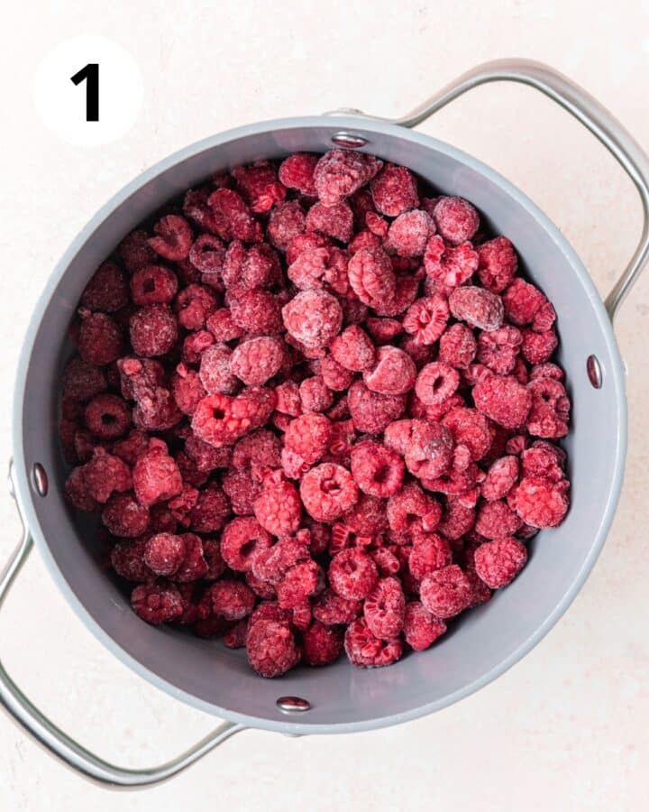 frozen raspberries in pot.