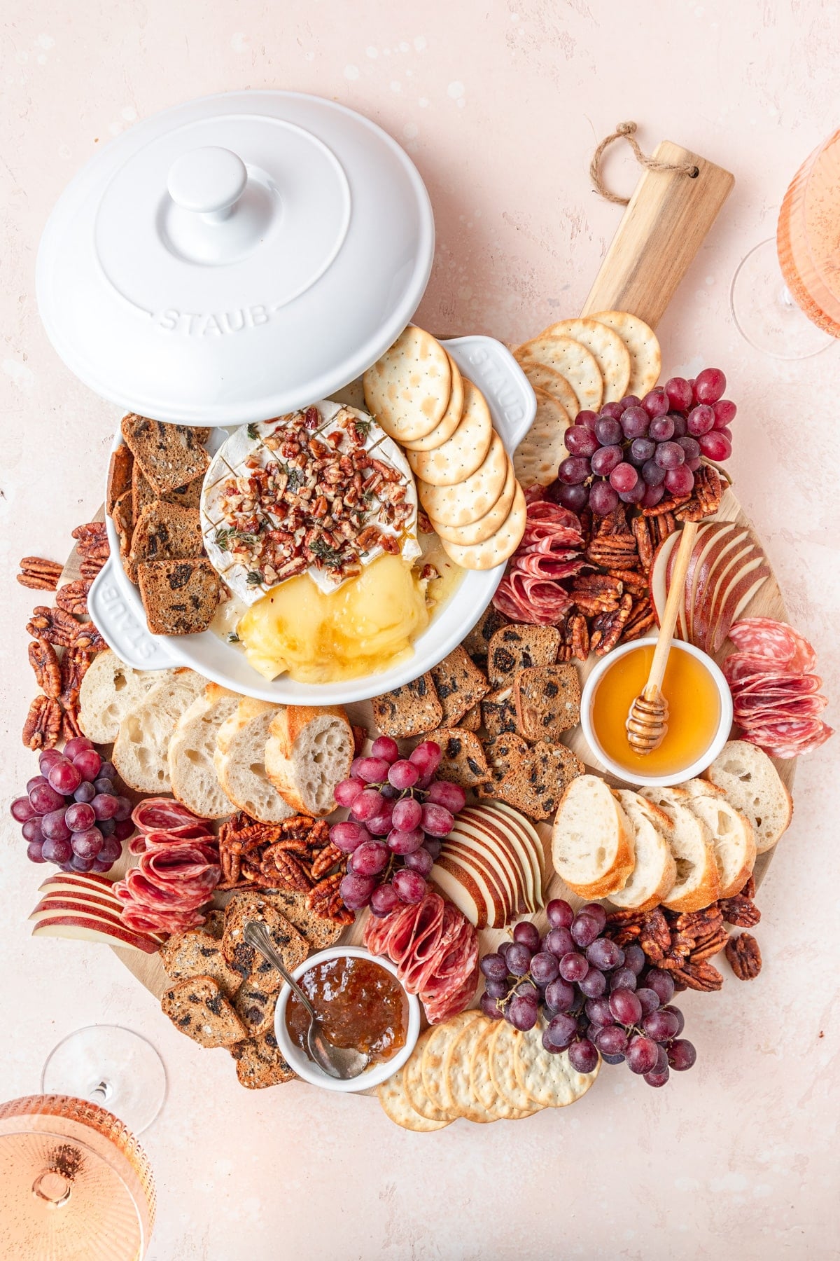 cheese board with wheel of Baked Brie.