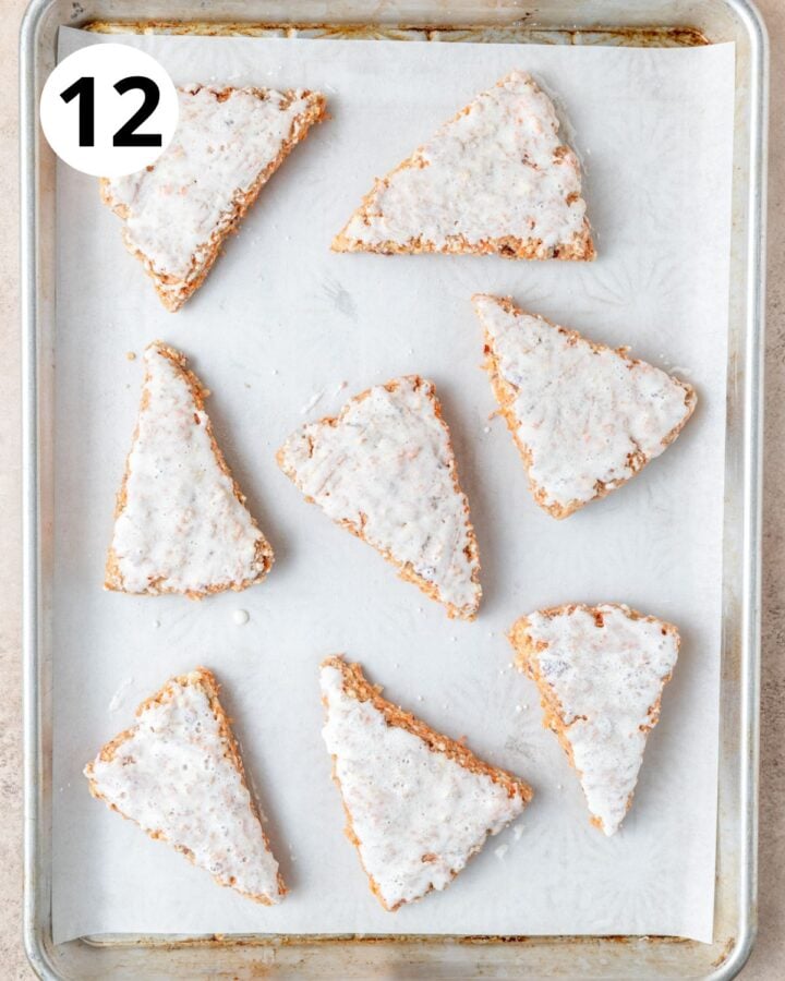 carrot cake scones brushed with cream before baking.