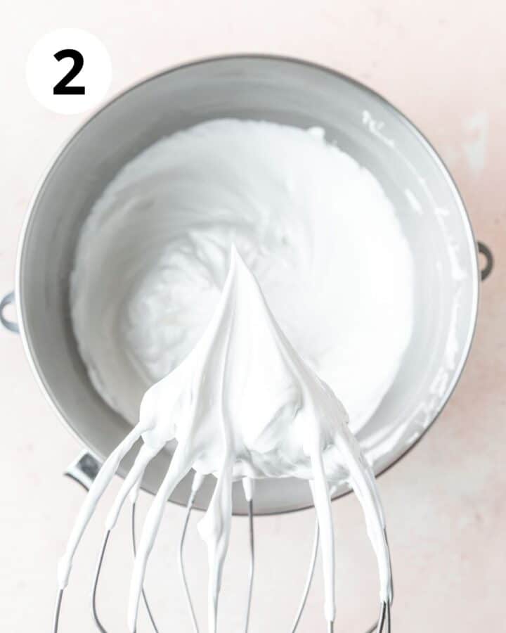 whipping egg whites to soft peaks.