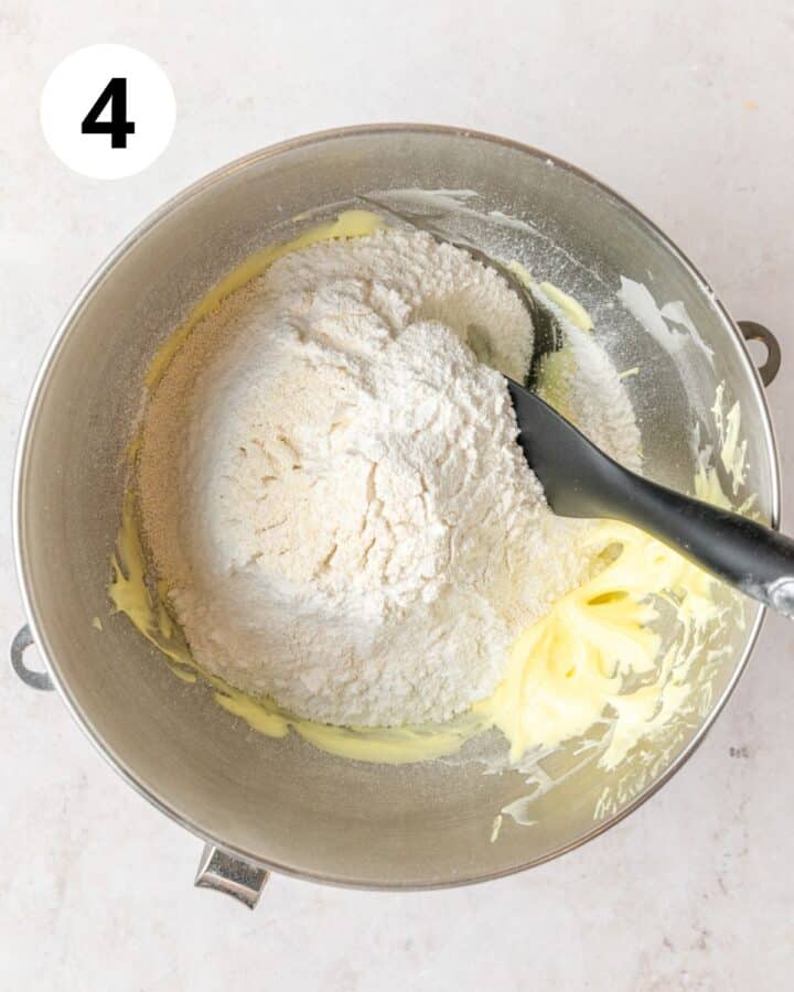 adding dry ingredients to egg whites. 