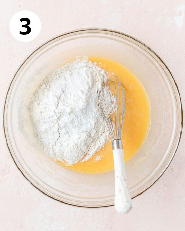 adding dry ingredients to batter.