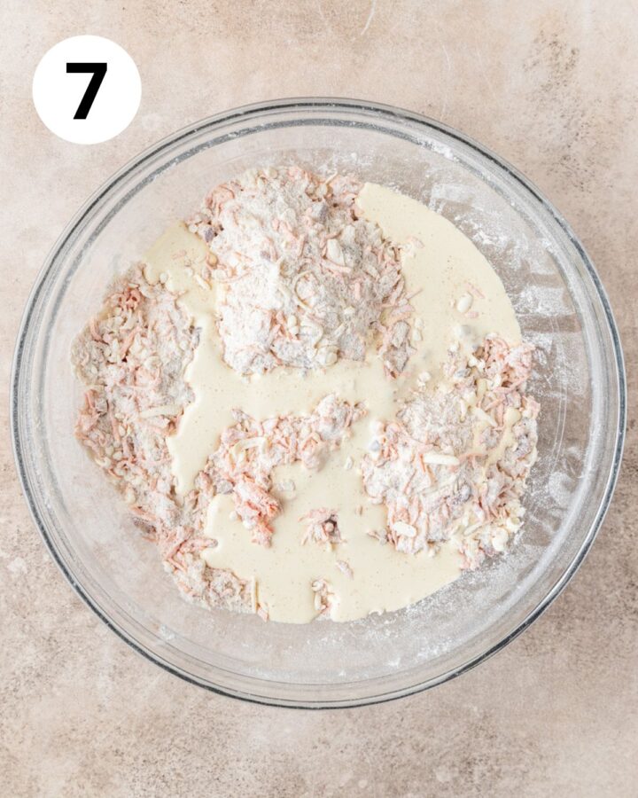 adding wet ingredients to mixture.