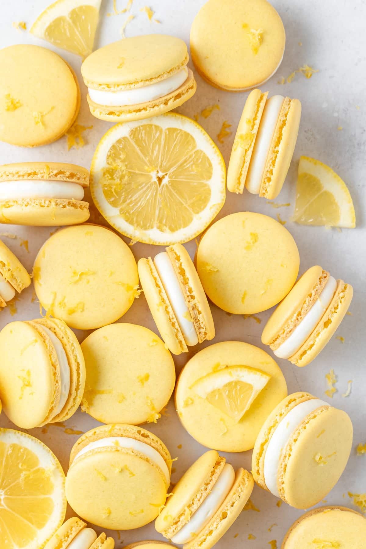 lemon macarons filled with tangy cream cheese frosting.