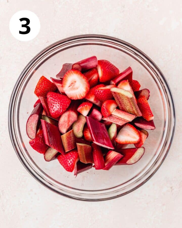 large chunks of rhubarb and strawberries in bowl.
