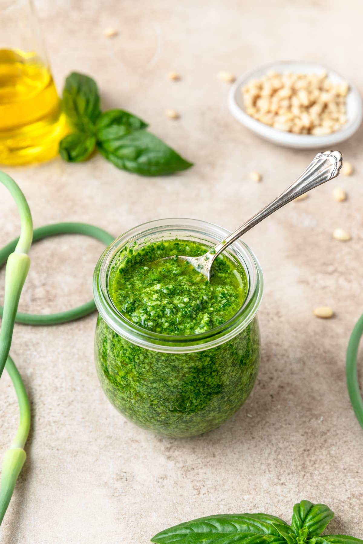 jar of garlic scape basil pesto.