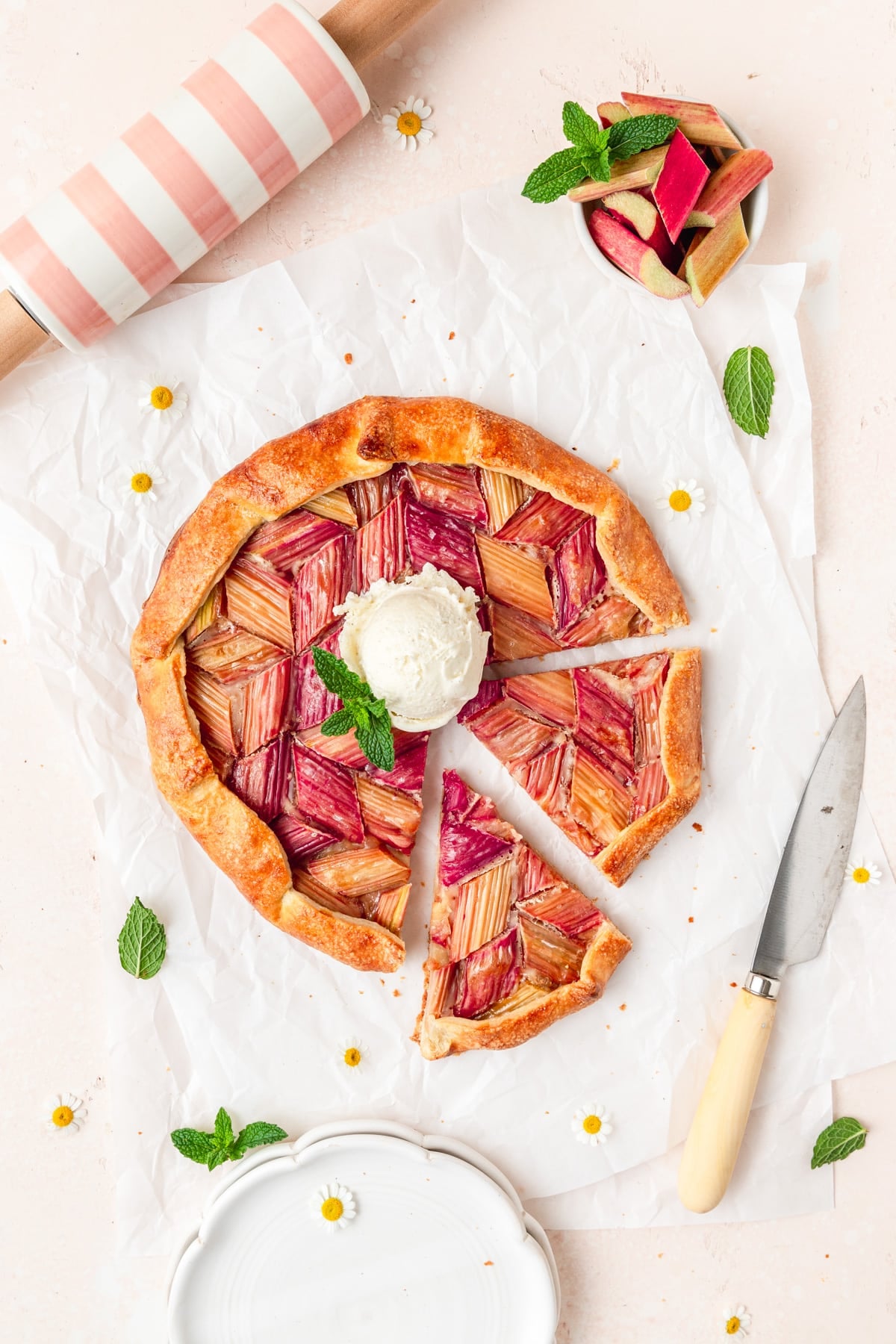 rhubarb galette topped with ice cream.