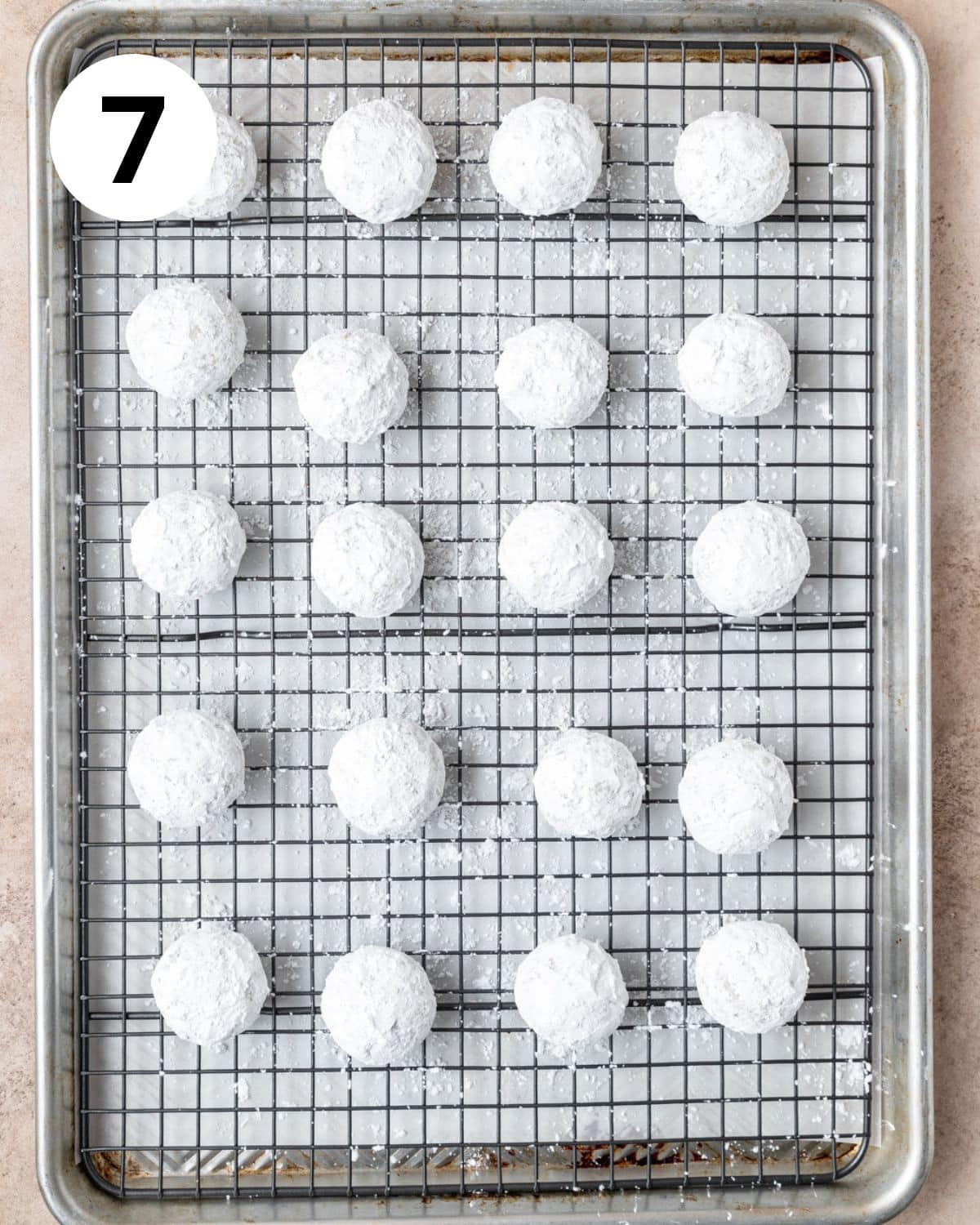 snowball cookies after second roll in powdered sugar.