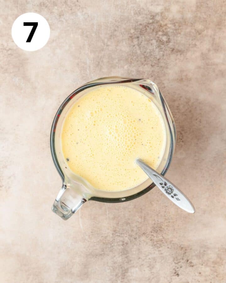 adding milk and cream to egg mixture.