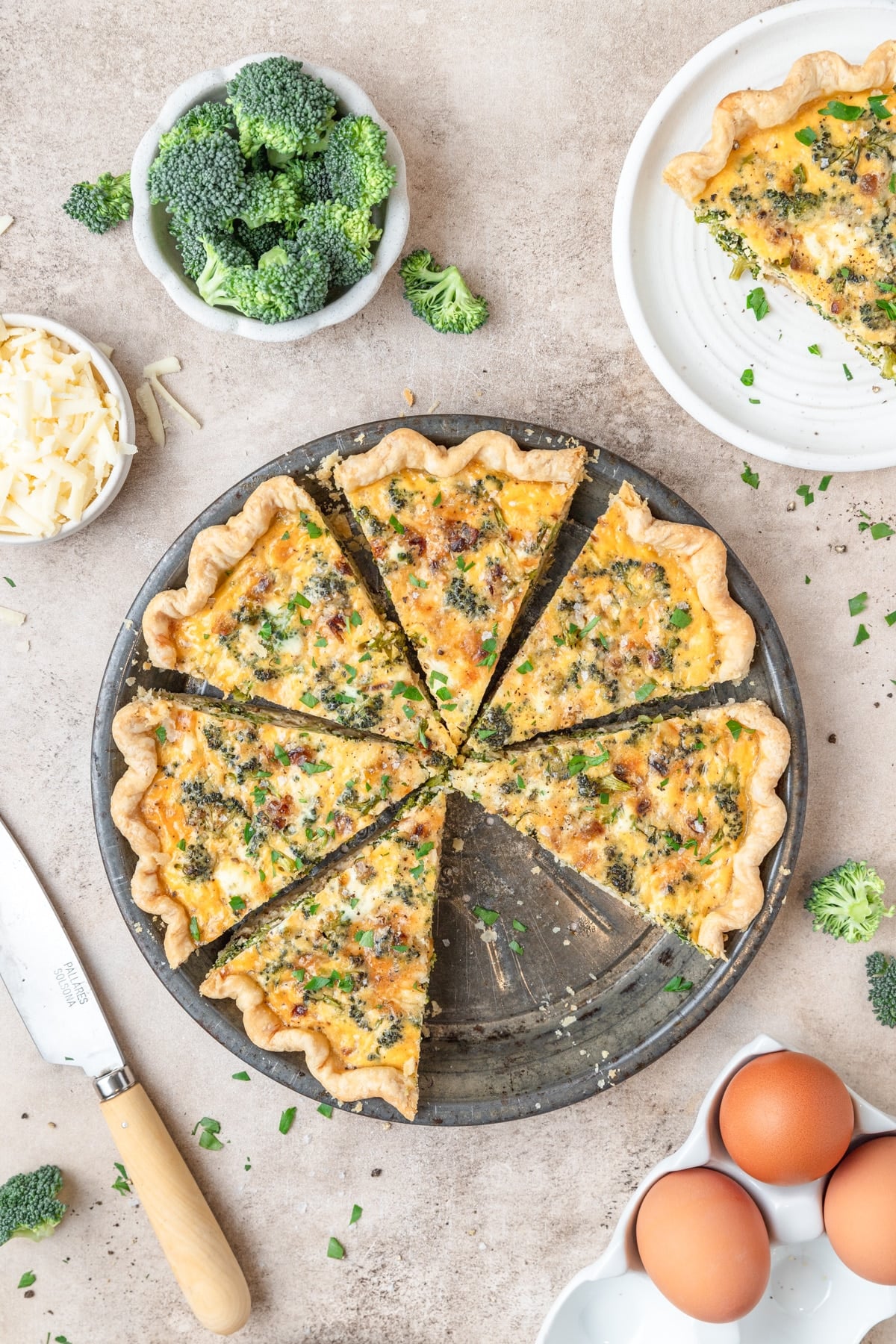 broccoli white cheddar quiche with homemade pie crust.