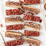 pecan pie cookie bars with brown butter shortbread crust.