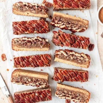 pecan pie cookie bars with brown butter shortbread crust.