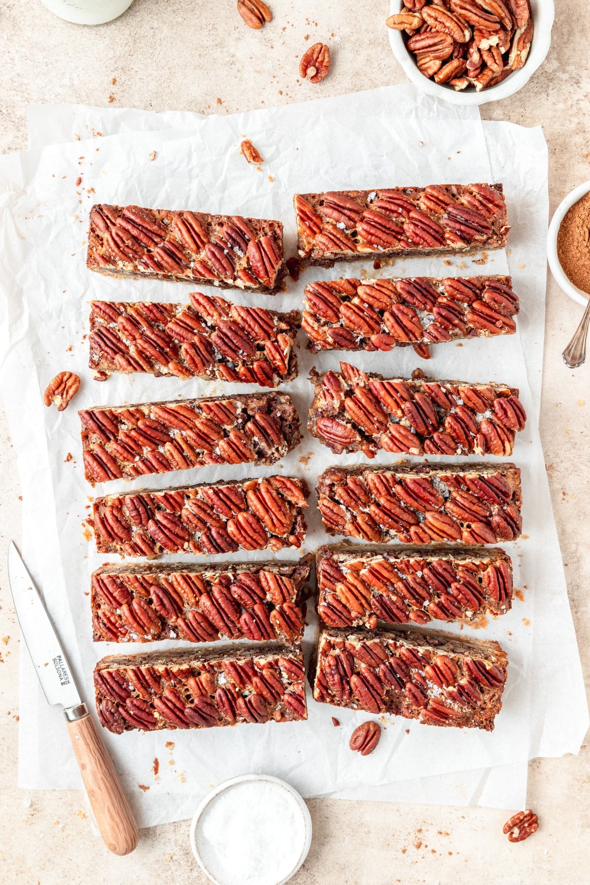 pecan pie bars cut into slices.