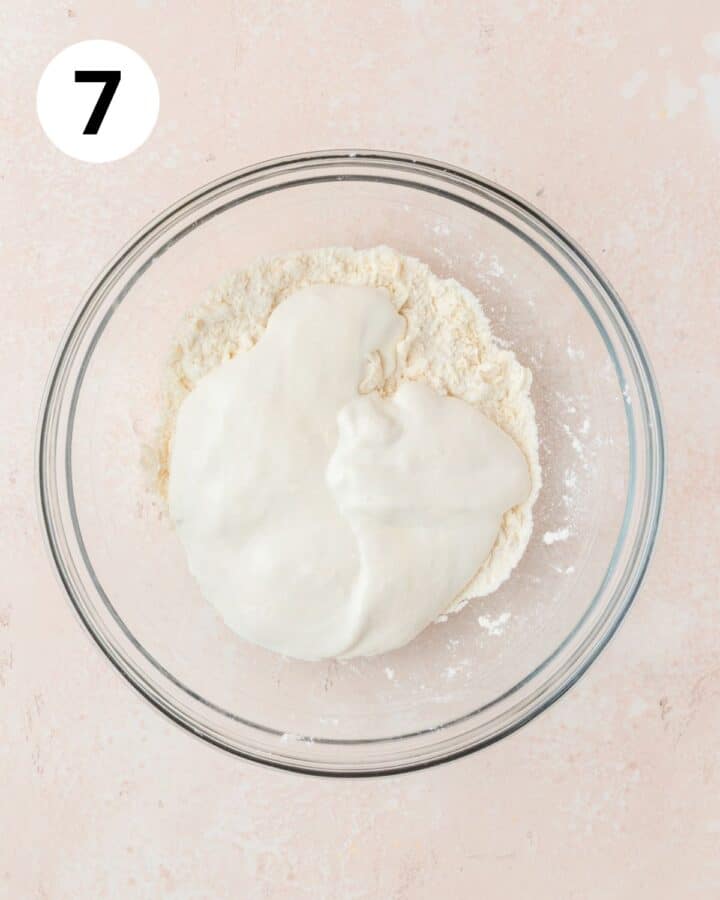 adding sourdough mixture to flour.
