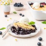 sourdough blueberry cobbler with fluffy sourdough topping.