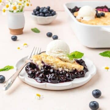 sourdough blueberry cobbler with fluffy sourdough topping.